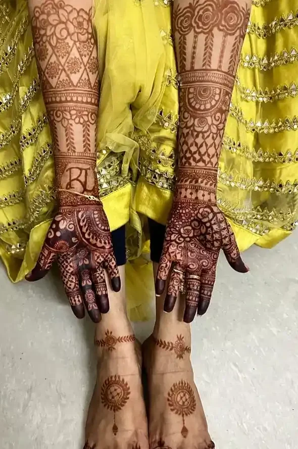 showing her mehndi stain